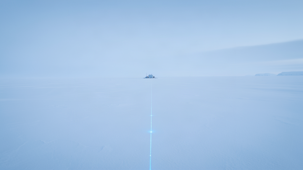 A vast white Antarctic ice plain under a pale sky, a small research station in the distance, a thin line of lights descending into the ice